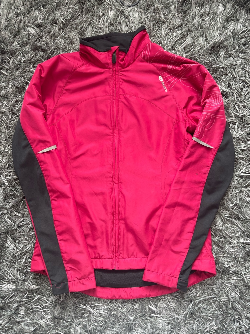Sugoi women's pink cycling jacket